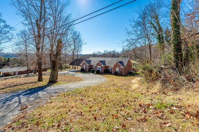 Welcome to this wonderful home overlooking the 12th green the on Dayton Golf and Country Club in Tennessee - for sale on GolfHomes.com, golf home, golf lot