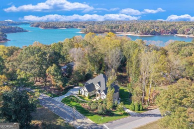 Nestled on the serene shores of Lake Lanier, this exquisite on Chattahoochee Golf Course in Georgia - for sale on GolfHomes.com, golf home, golf lot