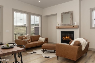 Tucked against a serene hillside in the coveted Grand Elk golf on Grand Elk Ranch and Club in Colorado - for sale on GolfHomes.com, golf home, golf lot