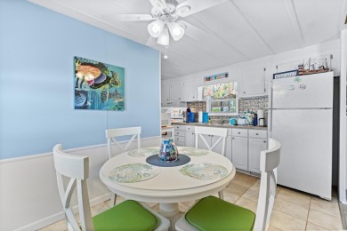 Welcome to a charming 3-bedroom, 2-bathroom home nestled in the on Barefoot Resort and Golf Club  in South Carolina - for sale on GolfHomes.com, golf home, golf lot
