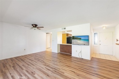 Inviting 55+ end-unit home located in the heart of Menifee on Cherry Hills Golf Club in California - for sale on GolfHomes.com, golf home, golf lot