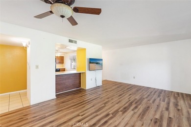 Inviting 55+ end-unit home located in the heart of Menifee on Cherry Hills Golf Club in California - for sale on GolfHomes.com, golf home, golf lot