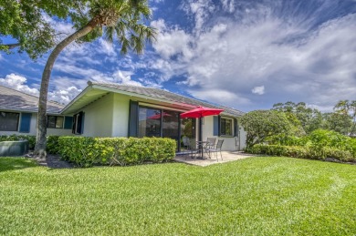 Located in the highly desirable Club Cottages community within on PGA National Golf Club in Florida - for sale on GolfHomes.com, golf home, golf lot