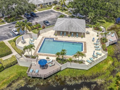 Located in the highly desirable Club Cottages community within on PGA National Golf Club in Florida - for sale on GolfHomes.com, golf home, golf lot