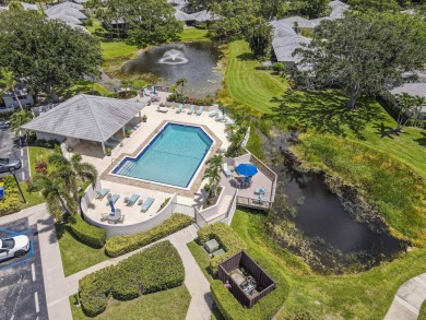 Located in the highly desirable Club Cottages community within on PGA National Golf Club in Florida - for sale on GolfHomes.com, golf home, golf lot