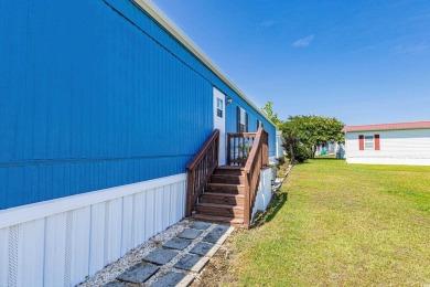 Welcome to a charming 3-bedroom, 2-bathroom home nestled in the on Barefoot Resort and Golf Club  in South Carolina - for sale on GolfHomes.com, golf home, golf lot