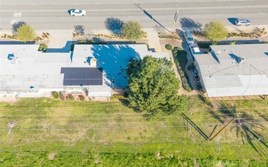 Inviting 55+ end-unit home located in the heart of Menifee on Cherry Hills Golf Club in California - for sale on GolfHomes.com, golf home, golf lot