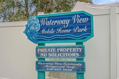 Welcome to a charming 3-bedroom, 2-bathroom home nestled in the on Barefoot Resort and Golf Club  in South Carolina - for sale on GolfHomes.com, golf home, golf lot
