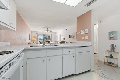 Move-in ready, turn-key 2 bedroom + den, 2 bathroom end-unit on Lehigh Resort Club in Florida - for sale on GolfHomes.com, golf home, golf lot