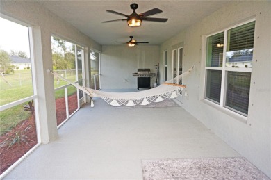 Spacious and impressive 4 Bedroom, 3 Bathroom home with attached on Deep Creek Golf Club in Florida - for sale on GolfHomes.com, golf home, golf lot