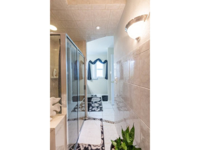 Welcome to your perfect retreat in the highly sought after Sun on Sun n Lake Golf and Country Club in Florida - for sale on GolfHomes.com, golf home, golf lot