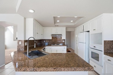 Tucked inside the Masters Collection of Eastlake Greens this on Eastlake Country Club in California - for sale on GolfHomes.com, golf home, golf lot