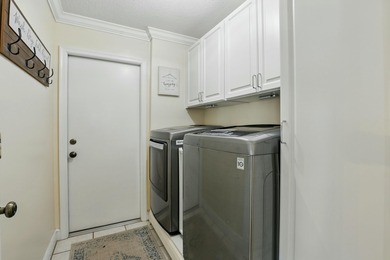 Just steps from top-rated Binks Forest Elementary, this on Binks Forest Golf Club in Florida - for sale on GolfHomes.com, golf home, golf lot