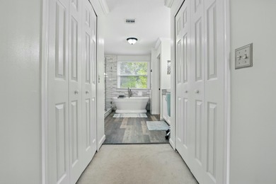 Just steps from top-rated Binks Forest Elementary, this on Binks Forest Golf Club in Florida - for sale on GolfHomes.com, golf home, golf lot