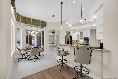 Discover the elegance of Monarch Country Club in this stunning on Monarch Country Club in Florida - for sale on GolfHomes.com, golf home, golf lot