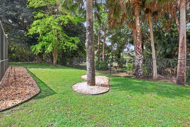 Just steps from top-rated Binks Forest Elementary, this on Binks Forest Golf Club in Florida - for sale on GolfHomes.com, golf home, golf lot