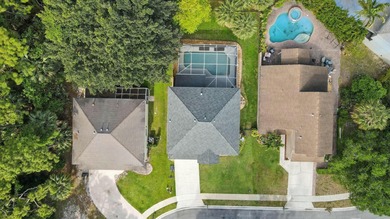 Just steps from top-rated Binks Forest Elementary, this on Binks Forest Golf Club in Florida - for sale on GolfHomes.com, golf home, golf lot