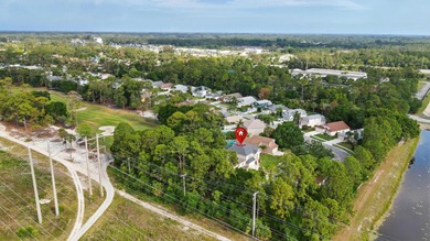 Just steps from top-rated Binks Forest Elementary, this on Binks Forest Golf Club in Florida - for sale on GolfHomes.com, golf home, golf lot