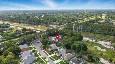 Just steps from top-rated Binks Forest Elementary, this on Binks Forest Golf Club in Florida - for sale on GolfHomes.com, golf home, golf lot