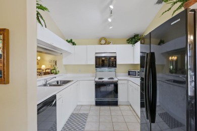 Welcome to this spacious villa in Boynton Beach that offers the on The Links At Boynton Beach - The Family Course in Florida - for sale on GolfHomes.com, golf home, golf lot