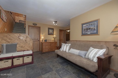 Rustic Cabin Retreat with Lake & Mountain Views in Columbine on Grand Lake Golf Course in Colorado - for sale on GolfHomes.com, golf home, golf lot