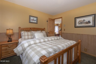 Rustic Cabin Retreat with Lake & Mountain Views in Columbine on Grand Lake Golf Course in Colorado - for sale on GolfHomes.com, golf home, golf lot