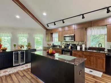 This beautifully updated and meticulously maintained golf course on Magellan Golf Course in Arkansas - for sale on GolfHomes.com, golf home, golf lot
