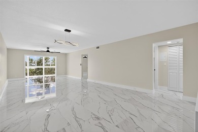 NEWLY RENOVATED EXTRA LARGE CORNER 2BR/2BATH CONDO IN THE SOUGHT on Wynmoor Golf Course in Florida - for sale on GolfHomes.com, golf home, golf lot