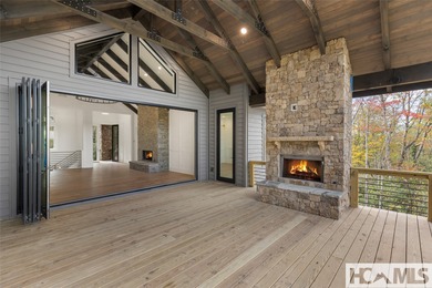 Nestled within the gates of Wildcat Cliffs Country Club but part on Wildcat Cliffs Country Club in North Carolina - for sale on GolfHomes.com, golf home, golf lot