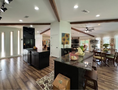 This beautifully updated and meticulously maintained golf course on Magellan Golf Course in Arkansas - for sale on GolfHomes.com, golf home, golf lot