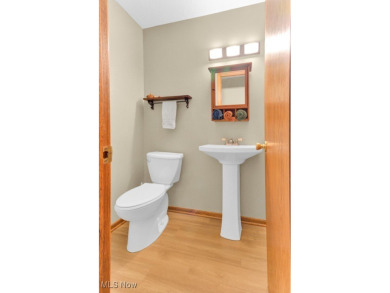 Welcome to this beautifully updated home nestled on a serene on Lake Mohawk Golf Club in Ohio - for sale on GolfHomes.com, golf home, golf lot