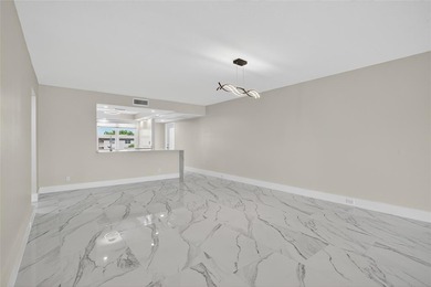 NEWLY RENOVATED EXTRA LARGE CORNER 2BR/2BATH CONDO IN THE SOUGHT on Wynmoor Golf Course in Florida - for sale on GolfHomes.com, golf home, golf lot