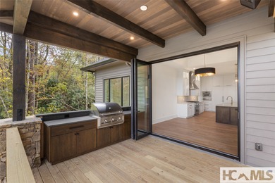 Nestled within the gates of Wildcat Cliffs Country Club but part on Wildcat Cliffs Country Club in North Carolina - for sale on GolfHomes.com, golf home, golf lot