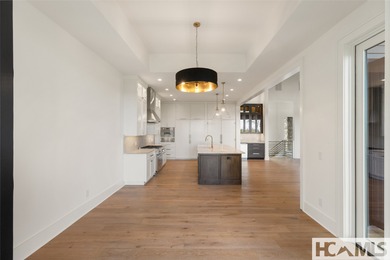 Nestled within the gates of Wildcat Cliffs Country Club but part on Wildcat Cliffs Country Club in North Carolina - for sale on GolfHomes.com, golf home, golf lot