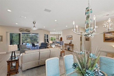 Welcome Home to this beautifully expanded Royal Palm in the on Harbor Hills Country Club in Florida - for sale on GolfHomes.com, golf home, golf lot