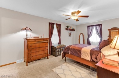 Welcome to this beautifully updated home nestled on a serene on Lake Mohawk Golf Club in Ohio - for sale on GolfHomes.com, golf home, golf lot