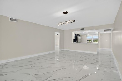 NEWLY RENOVATED EXTRA LARGE CORNER 2BR/2BATH CONDO IN THE SOUGHT on Wynmoor Golf Course in Florida - for sale on GolfHomes.com, golf home, golf lot