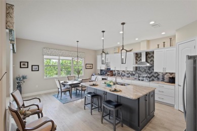 Welcome Home to this beautifully expanded Royal Palm in the on Harbor Hills Country Club in Florida - for sale on GolfHomes.com, golf home, golf lot