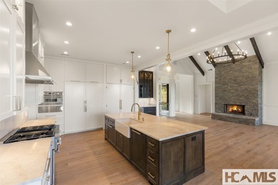 Nestled within the gates of Wildcat Cliffs Country Club but part on Wildcat Cliffs Country Club in North Carolina - for sale on GolfHomes.com, golf home, golf lot