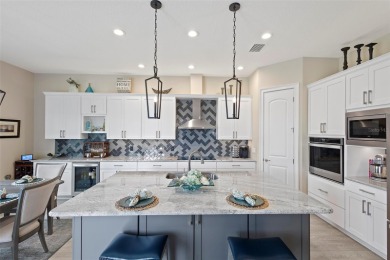 Welcome Home to this beautifully expanded Royal Palm in the on Harbor Hills Country Club in Florida - for sale on GolfHomes.com, golf home, golf lot