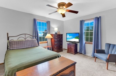 Welcome to this beautifully updated home nestled on a serene on Lake Mohawk Golf Club in Ohio - for sale on GolfHomes.com, golf home, golf lot