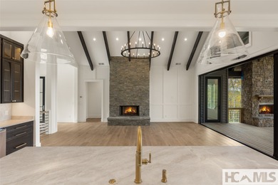 Nestled within the gates of Wildcat Cliffs Country Club but part on Wildcat Cliffs Country Club in North Carolina - for sale on GolfHomes.com, golf home, golf lot