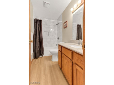 Welcome to this beautifully updated home nestled on a serene on Lake Mohawk Golf Club in Ohio - for sale on GolfHomes.com, golf home, golf lot