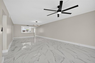NEWLY RENOVATED EXTRA LARGE CORNER 2BR/2BATH CONDO IN THE SOUGHT on Wynmoor Golf Course in Florida - for sale on GolfHomes.com, golf home, golf lot