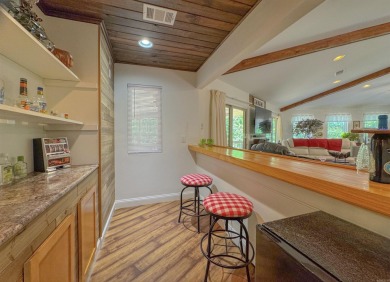 This beautifully updated and meticulously maintained golf course on Magellan Golf Course in Arkansas - for sale on GolfHomes.com, golf home, golf lot