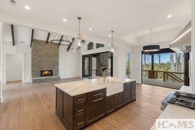 Nestled within the gates of Wildcat Cliffs Country Club but part on Wildcat Cliffs Country Club in North Carolina - for sale on GolfHomes.com, golf home, golf lot