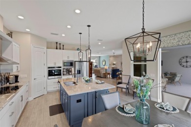 Welcome Home to this beautifully expanded Royal Palm in the on Harbor Hills Country Club in Florida - for sale on GolfHomes.com, golf home, golf lot
