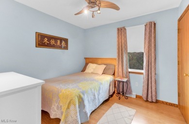 Welcome to this beautifully updated home nestled on a serene on Lake Mohawk Golf Club in Ohio - for sale on GolfHomes.com, golf home, golf lot