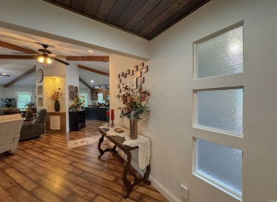This beautifully updated and meticulously maintained golf course on Magellan Golf Course in Arkansas - for sale on GolfHomes.com, golf home, golf lot