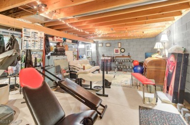 Welcome to this beautifully updated home nestled on a serene on Lake Mohawk Golf Club in Ohio - for sale on GolfHomes.com, golf home, golf lot